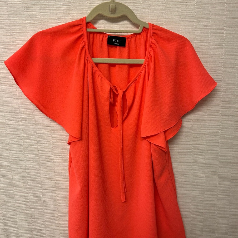 Tyche Vibrant Coral Flutter Sleeve Blouse